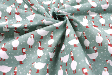 Baumwollstoff mit weihnachtlichen Gänsen 