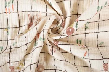 Musselin-Stoff mit Hasen und Karos 