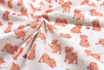 Baumwollstoff mit rosa Schweinchen 