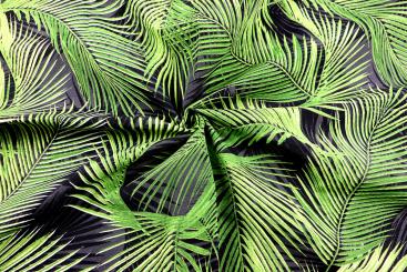 Dekostoff mit Palmblättern 
