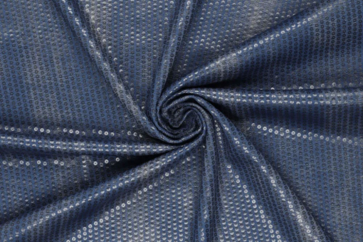 Jeansstoff mit schimmernden Pailletten 