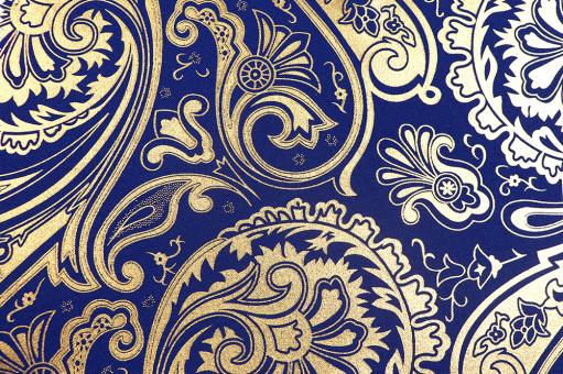 Goldener Universalstoff mit Paisley Ornamenten 