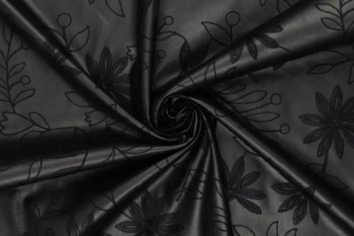 Besticktes Lederimitat mit Ranken 