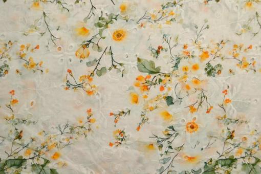 Bestickter Baumwollstoff mit Blumenwiese 