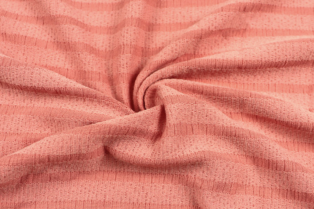 Strickjersey - Coral Melange 